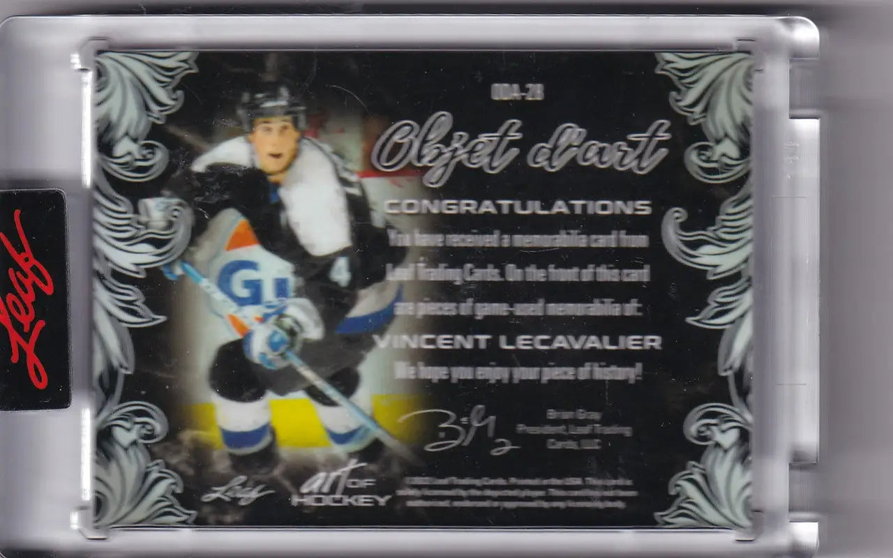 Hockey dual relic card featuring Vincent Lecavalier in ornate black and silver design