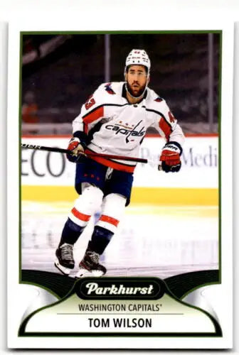 Hockey trading card of Tom Wilson in a white Capitals jersey by Upper Deck Parkhurst