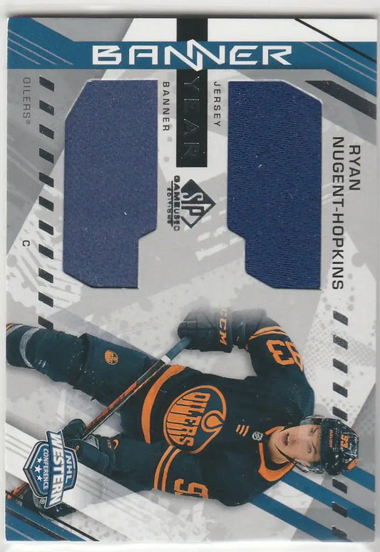 Hockey player in dark jersey with orange accents for 2021-22 Upper Deck Ryan Nugent-Hopkins Banner Year Relic