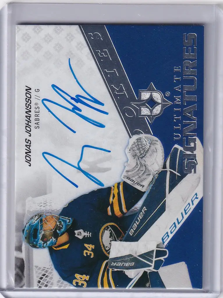 Signed hockey trading card of Jonas Johansson in Buffalo Sabres blue and yellow uniform