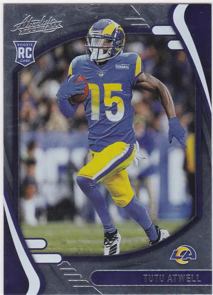 Football player Tutu Atwell in blue and yellow uniform on Los Angeles Rams field