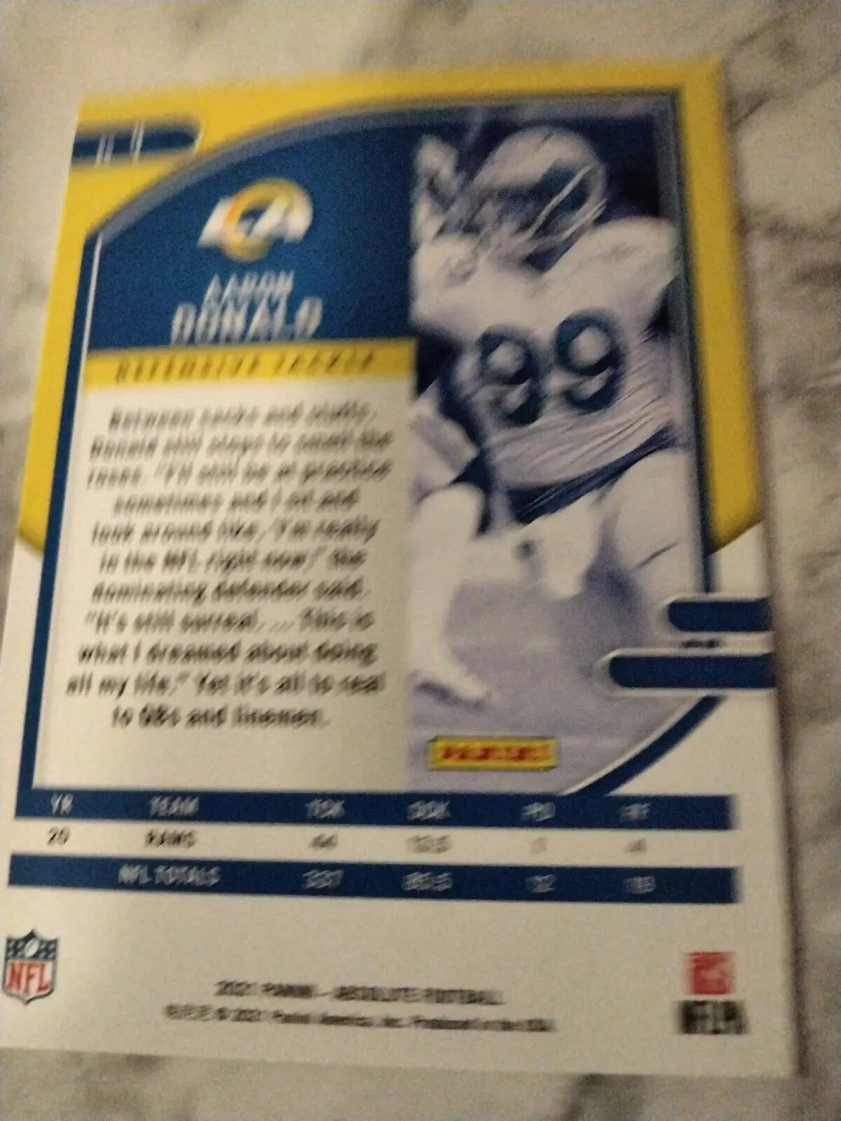 Aaron Donald trading card from 2021 Panini Absolute Green Foil Los Angeles Rams