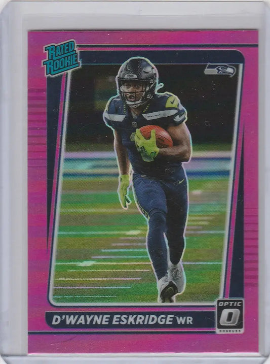 Football trading card of D’Wayne Eskridge running with the ball, Donruss Optice Prizm Pink