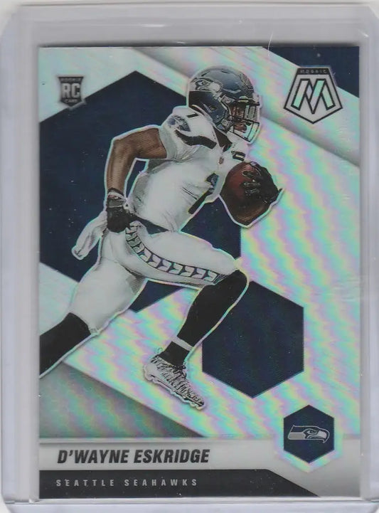 Football trading card of D’Wayne Eskridge in white uniform running for the Seahawks, Panini Mosaic Prizm