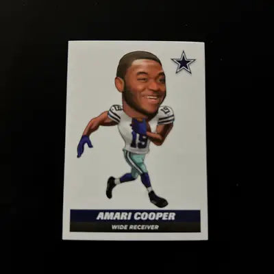 Amari Cooper Dallas Cowboys football card from 2021 Panini Stickers #297 ILLUSTRATED