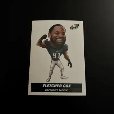 Fletcher Cox caricature on 2021 Panini Stickers #329 Philadelphia Eagles trading card