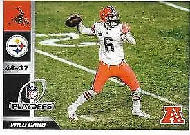 Football player in white jersey throws pass during AFC Wild Card Round, 2021 Panini Stickers