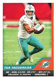 Football player in action featuring Tua Tagovailoa from Miami Dolphins Panini Stickers