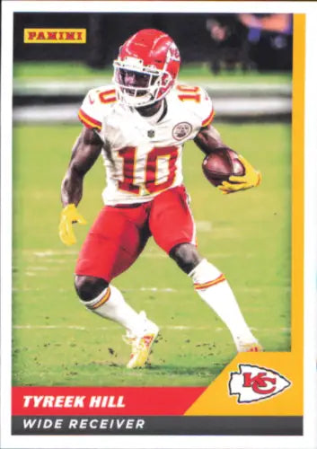 Kansas City Chiefs wide receiver Tyreek Hill running with a football in Panini Stickers