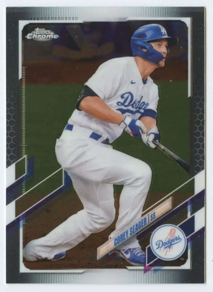 Baseball player in white Dodgers uniform swinging bat on Corey Seager card