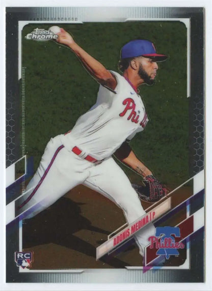 Adonis Medina in white Phillies uniform mid-pitching on 2021 baseball card