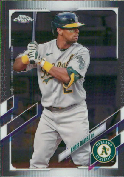 Khris Davis in Oakland Athletics road uniform batting on 2021 Topps Chrome Baseball Card