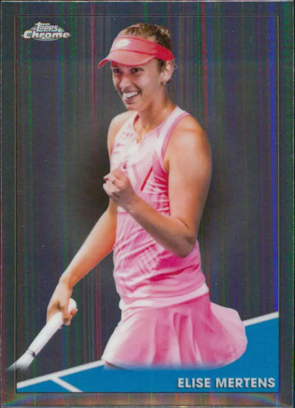 Elise Mertens celebrates on the court in a pink outfit, featured on Topps Chrome tennis card