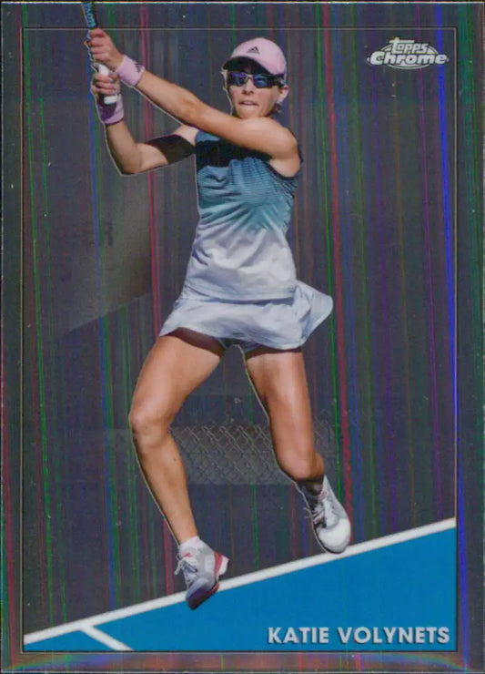 Katie Volynets in a light blue dress hitting a forehand in Topps Chrome tennis card