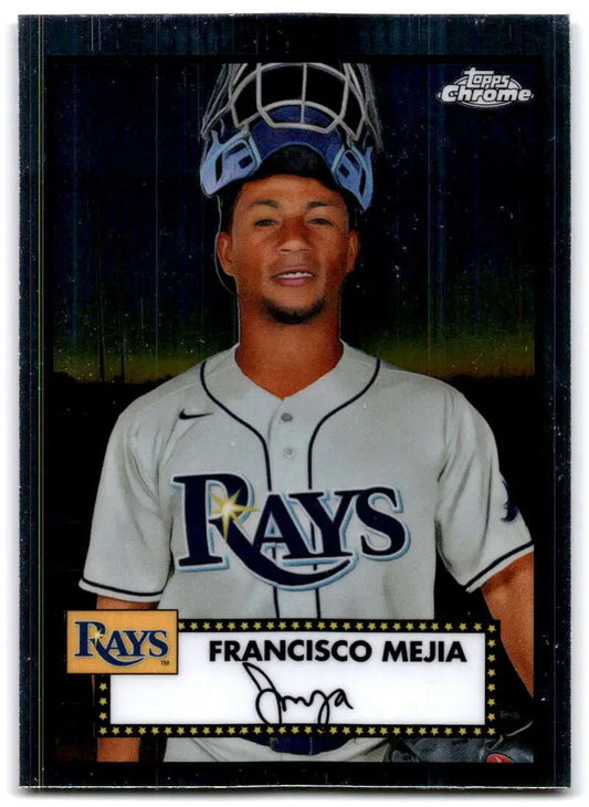 Francisco Mejia in Tampa Bay Rays home white jersey with catcher’s mask on head