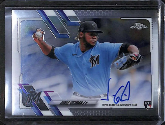 Jorge Guzman mid-throw in light blue uniform on Topps Chrome Rookie Auto Baseball Card