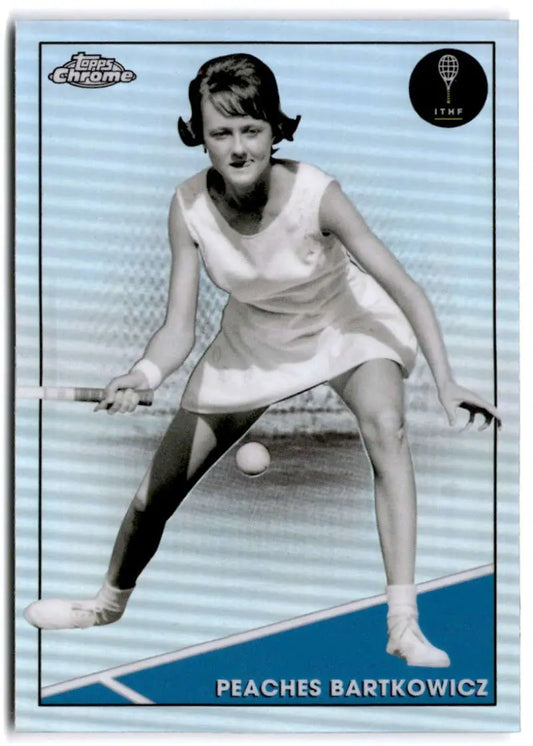 Vintage tennis player in white dress making a shot on 2021 Topps Chrome Refractor card