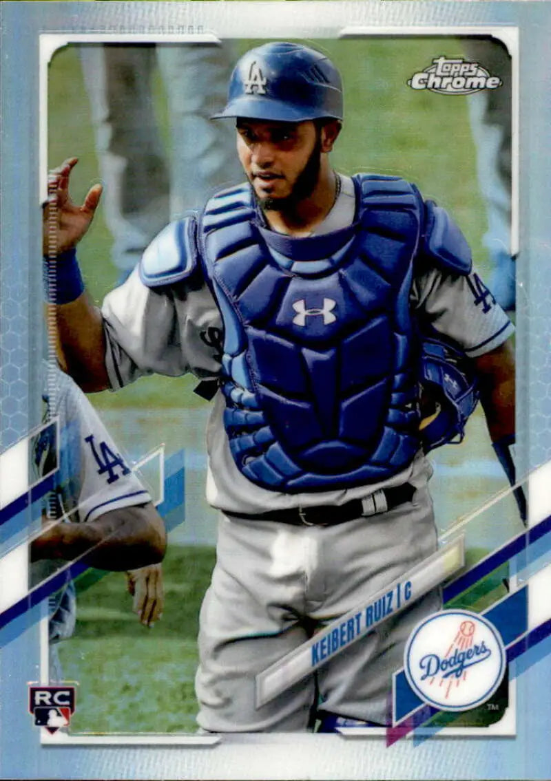 Baseball catcher in Los Angeles Dodgers gear showcasing Keibert Ruiz Rookie Card