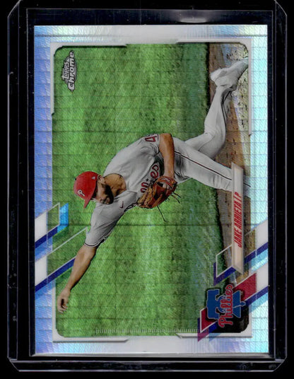 Jake Arrieta making a diving play on the field, featured in Topps Chrome Refractor Prism