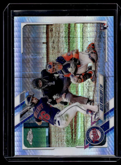 Baseball trading card of Alex Kirilloff at home plate featuring Minnesota Twins players