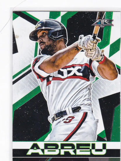 Jose Abreu Chicago White Sox player swinging bat in white uniform with SOX visible