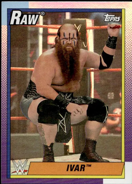 Bearded professional wrestler in black gear in ring from Topps Heritage WWE collection