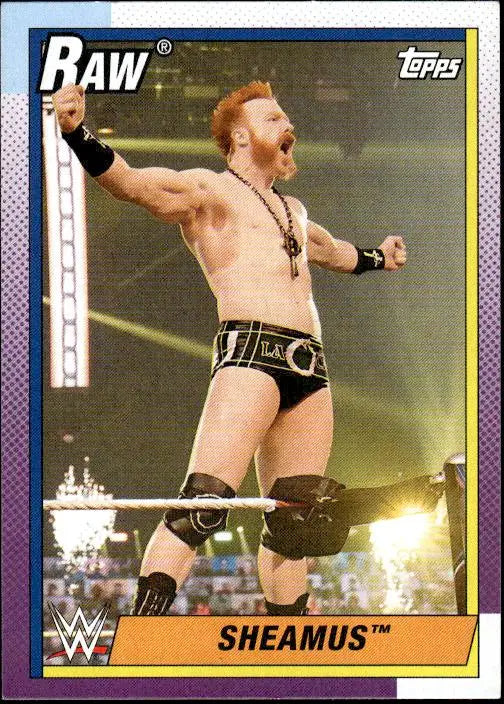 Topps Heritage WWE trading card of Sheamus celebrating in the ring during a match