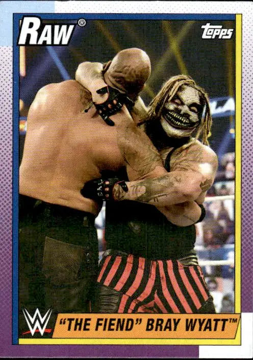 WWE trading card featuring Fiend Bray Wyatt in a scary mask and red/black striped pants