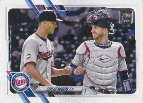 Baseball card of Minnesota Twins players celebrating from 2021 Topps Update set