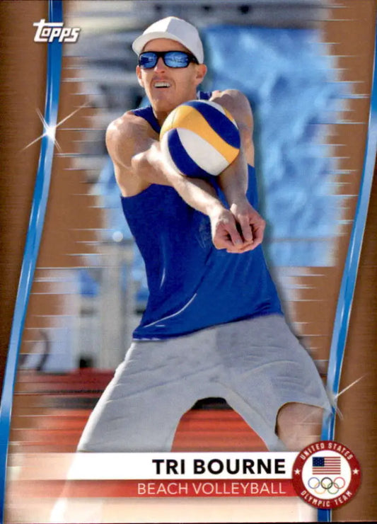 Tri Bourne making a defensive play in a beach volleyball match on a trading card