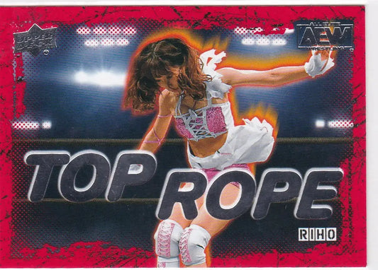 Female wrestler Riho performs a top rope move in Upper Deck AEW card 2021