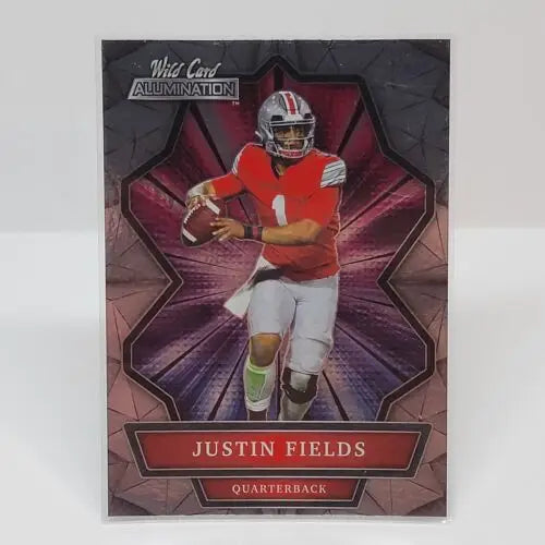 Football trading card of Justin Fields in red jersey, featuring Wild Card Alumination