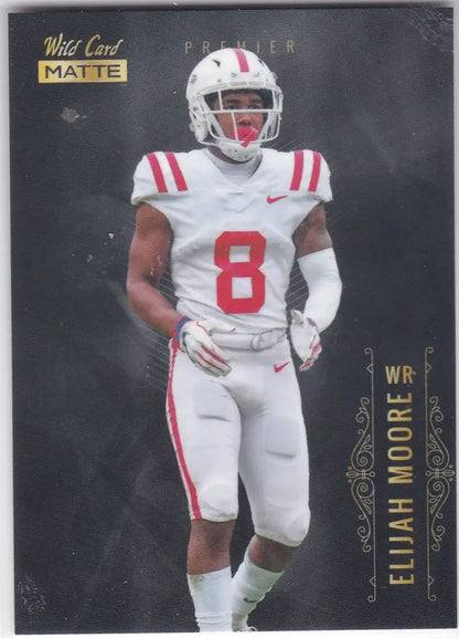 Football player in white uniform with red accents showcasing Elijah Moore Rookie card matte black