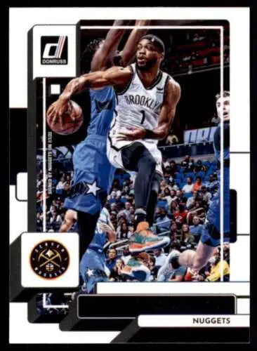 Basketball trading card of Bruce Brown driving against the Denver Nuggets, original gloss