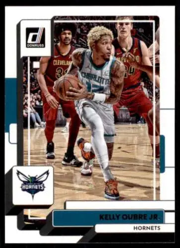 Basketball trading card of Kelly Oubre driving to the basket against Cavaliers defenders