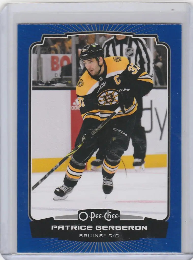 Patrice Bergeron in action on the ice for Boston Bruins 2022-23 OPC Hockey card