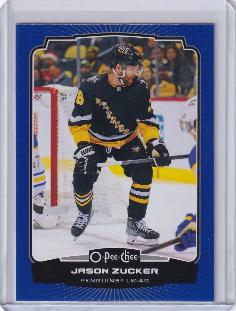 Hockey trading card of Jason Zucker in black and yellow uniform from OPC Hockey Blue