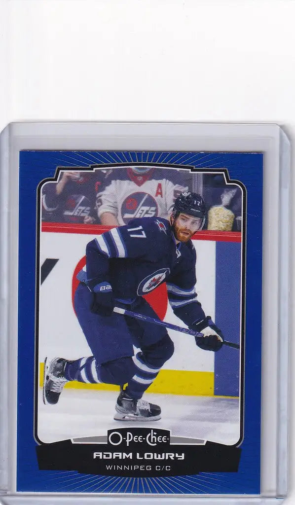 Hockey trading card of Adam Lowry in dark blue uniform for OPC Hockey Blue collection