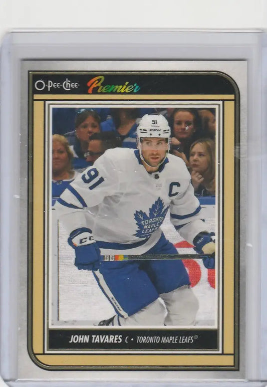 Hockey trading card of John Tavares in white Toronto Maple Leafs jersey, 2022-23 OPC Hockey