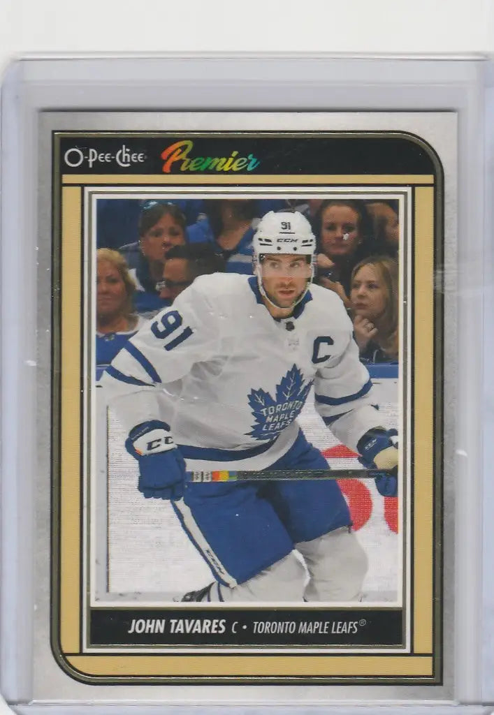 Hockey trading card of John Tavares in white Toronto Maple Leafs jersey, 2022-23 OPC Hockey