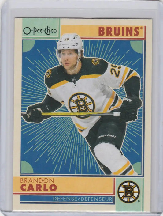 Hockey trading card of Brandon Carlo in white jersey for OPC Hockey Retro Boston Bruins