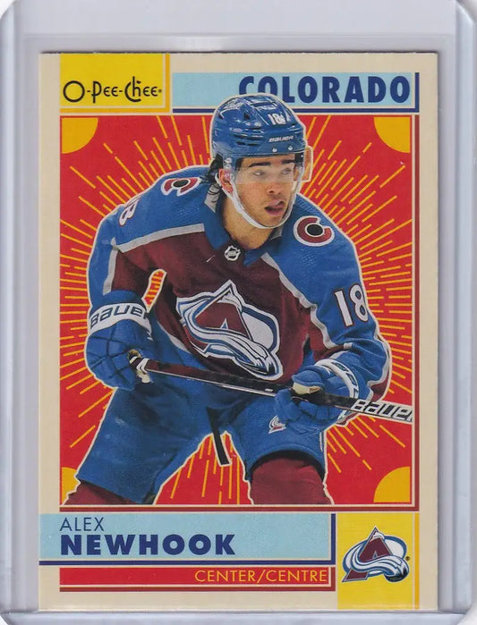 Hockey trading card of Alex Newhook in blue jersey from OPC Hockey Retro collection