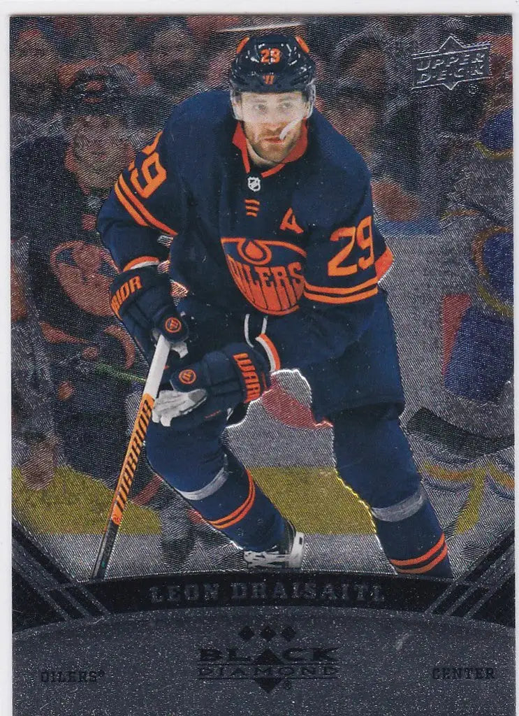 Hockey player in Edmonton Oilers uniform showcasing Leon Draisaitl Black Diamond card