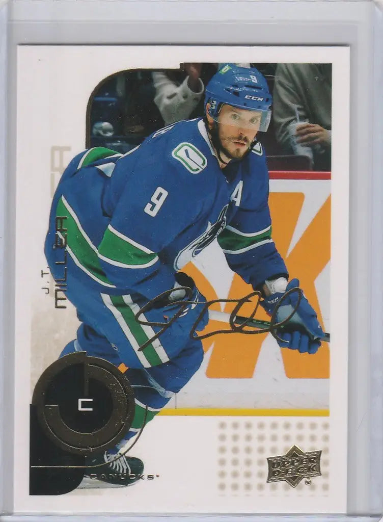 Hockey player in blue Vancouver Canucks jersey, showcasing Upper Deck MVP 20th Anniversary