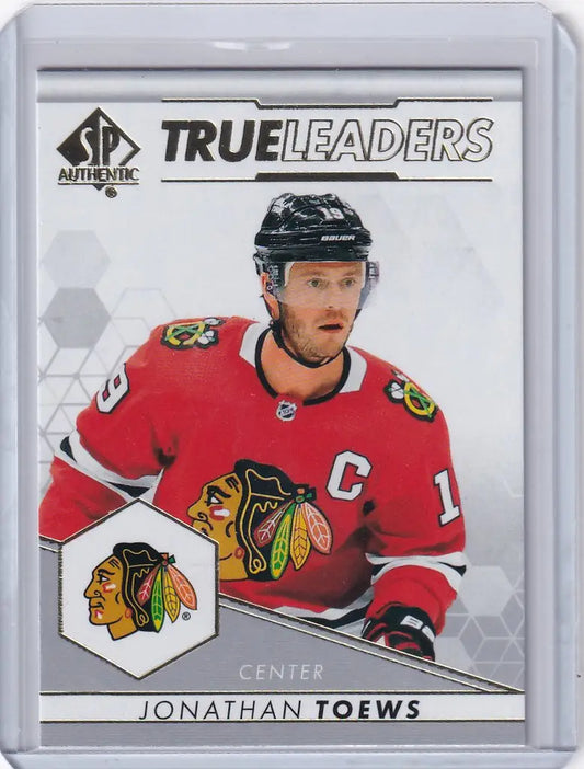 Hockey trading card of Jonathan Toews in red jersey for 2022-23 Upper Deck Chicago Blackhawks