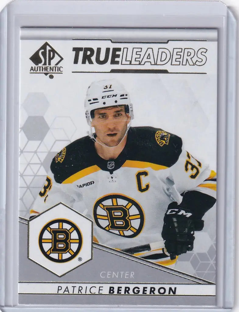 Hockey trading card of Patrice Bergeron in Boston Bruins white jersey, 2022-23 Upper Deck