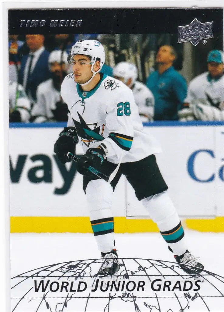 Hockey player in white jersey with teal accents, Timo Meier, San Jose Sharks, World Junior Grads