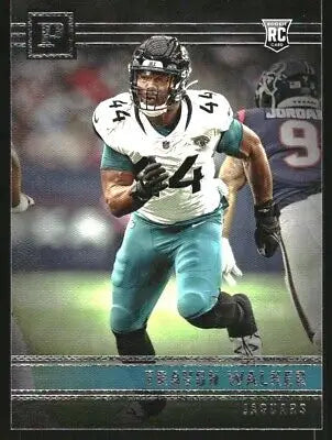 Football player in action featuring Travon Walker from Panini Chronicles Panini card