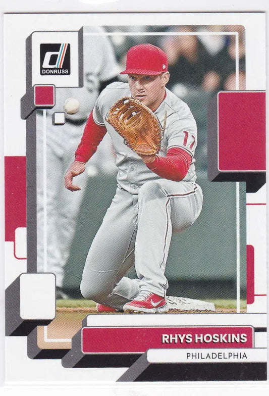 Rhys Hoskins fielding in defensive stance for the Philadelphia Phillies uniform