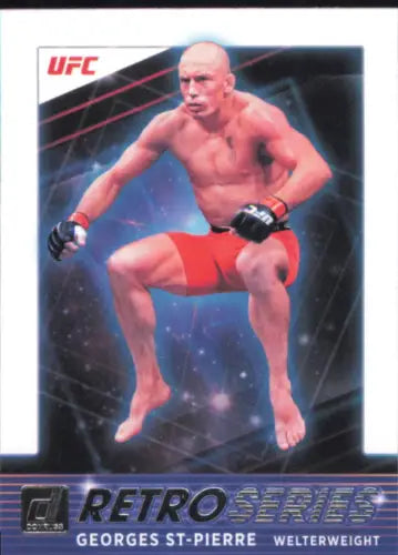 UFC fighter in red shorts crouches ready, featured on Donruss UFC Retro card